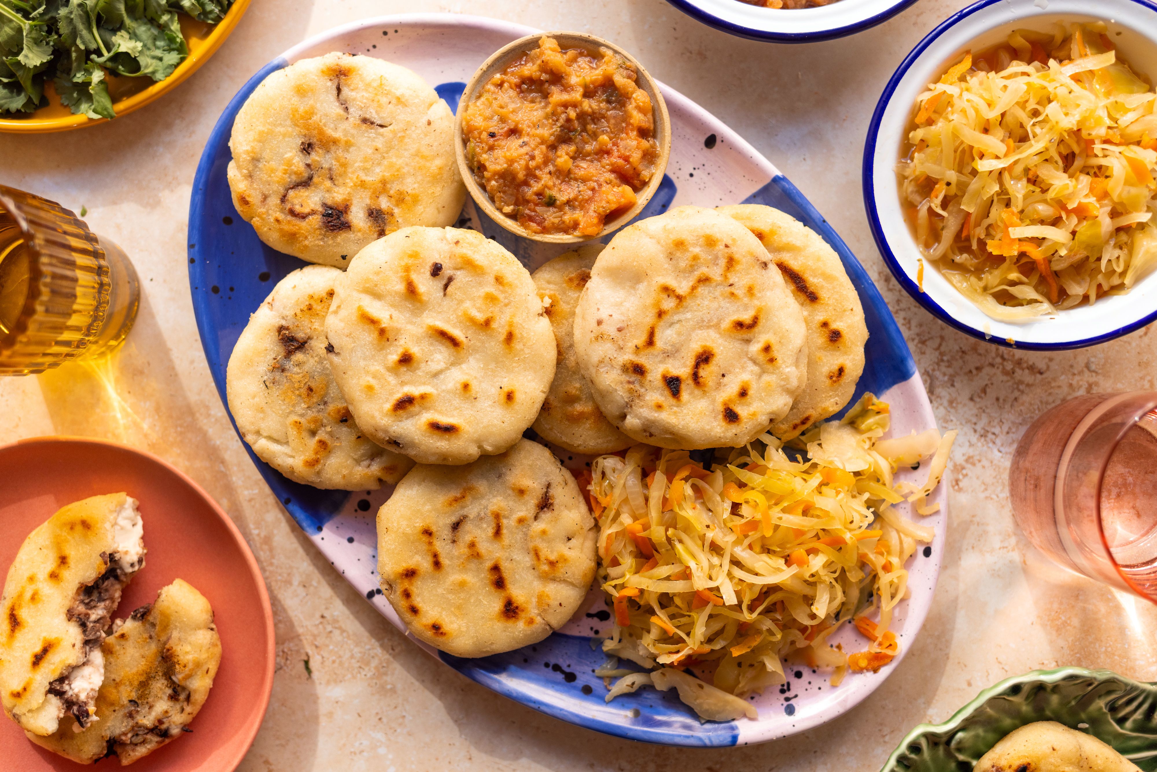Vegan Pupusas (Stuffed Flatbreads) with Beans and Cheese Filling, Salsa Roja and Curtido
