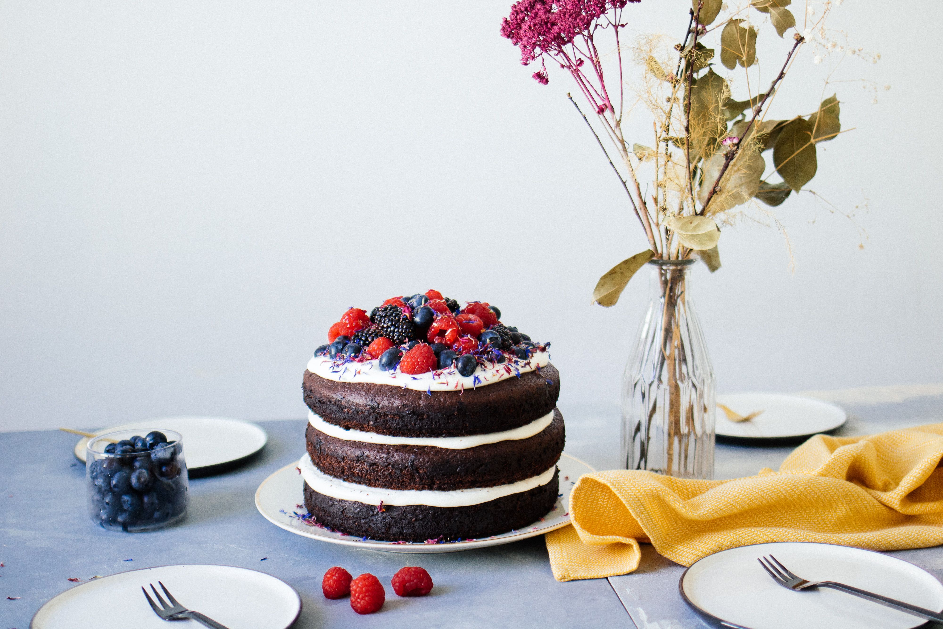 Simple, vegan chocolate cake with berries