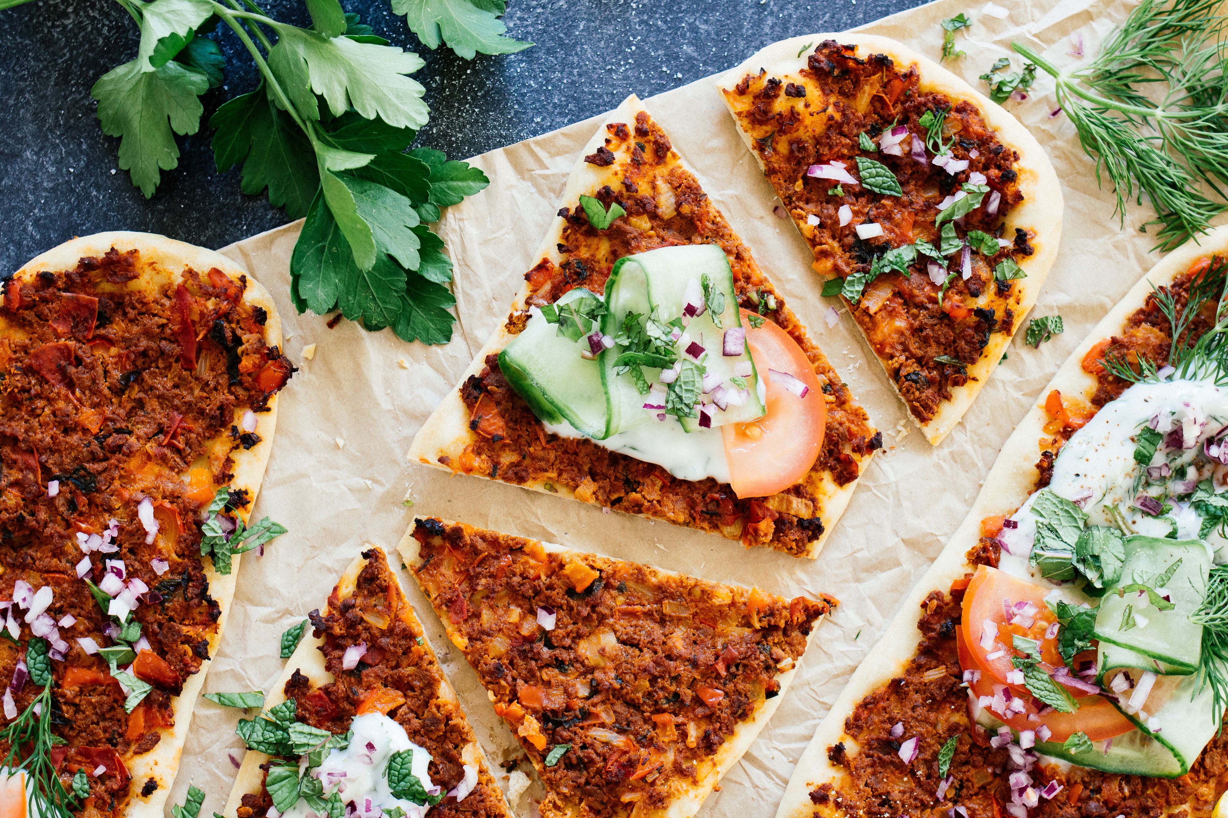 Vegan Turkish Pizza with herb yogurt sauce