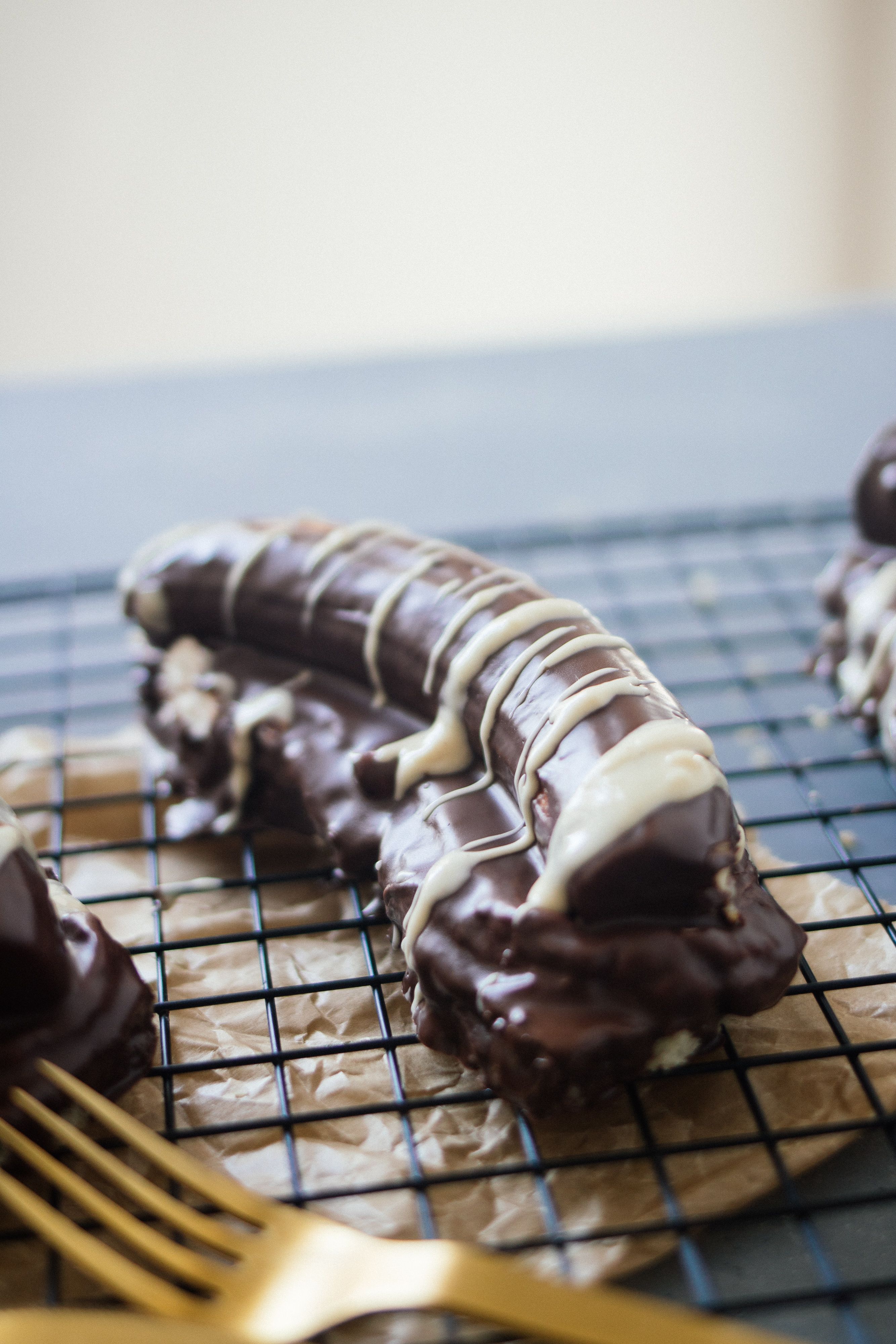 R306 Vegan chocolate covered banana with whipped cream & sponge cake